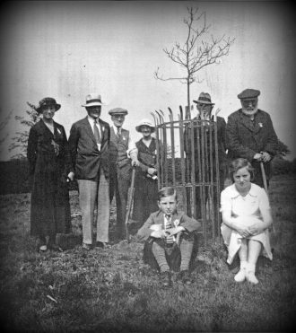 Commemorating George V's Silver Jubilee by planting an  oak tree on the Top Green. 