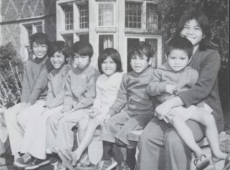 Seven 'Lost' [Vietnamese Boat] children at one of Ockenden's homes, 1978