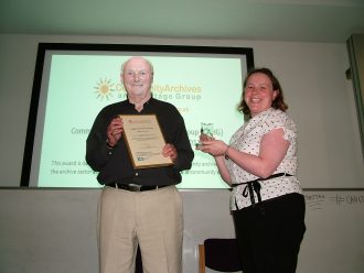 Marden History Group winners of the Community Archive of the Year Award 2011, Laura Cotton Chair of CAHG presenting David McFarland with the award