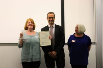 Dr Nick Barratt presenting the 2014 CAHG Awards to Isle of Jura Development Trust winners of Inspiration category and overall winners | Judith Harvey 