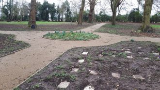 Leavesden cemetery stones | Image courtesy of Leavesden Hospital History Association