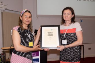 Audrey Wilson of CAHG with Eve Brennan, Scattery Island Heritage Group, winner of the Gathering and Preserving Heritage award, 2022.