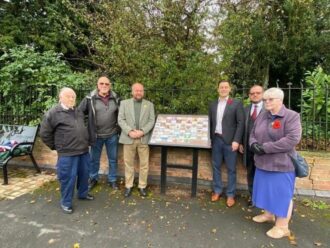 Local Archive Group and the local MP unveil the Remembrance Board. | Newbold Verdon Parish Archive